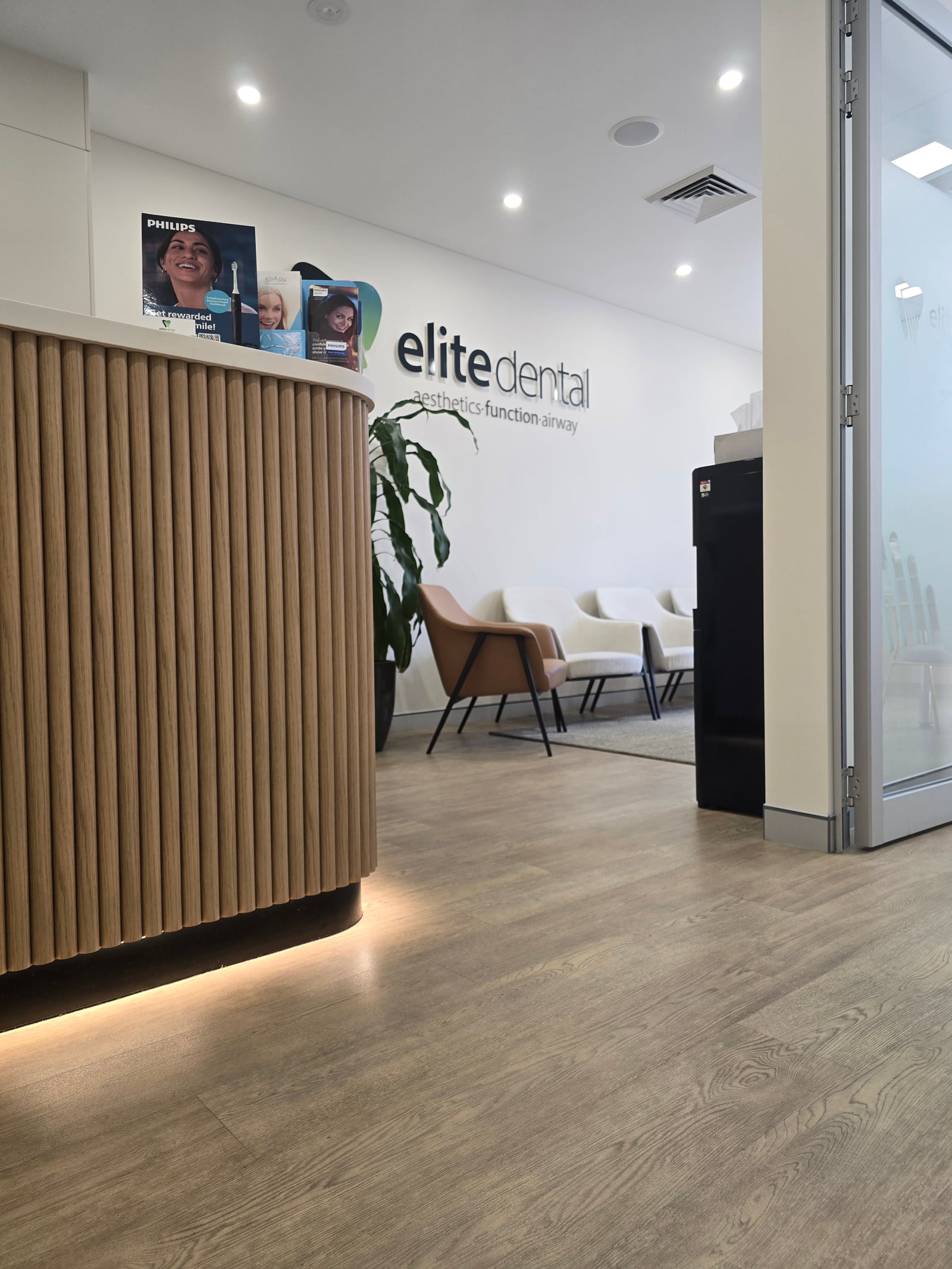 The reception desk and waiting area inside Newtown Elite Dental