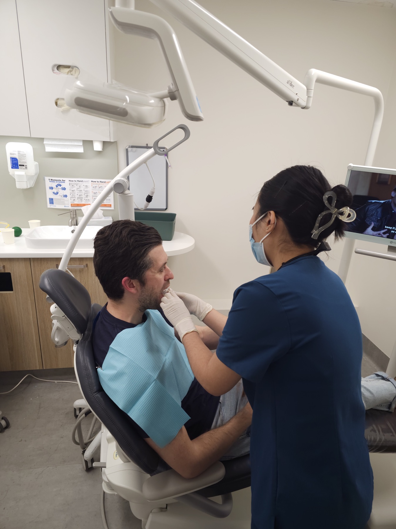 A patient receiving a clear explanation at Newtown Elite Dental